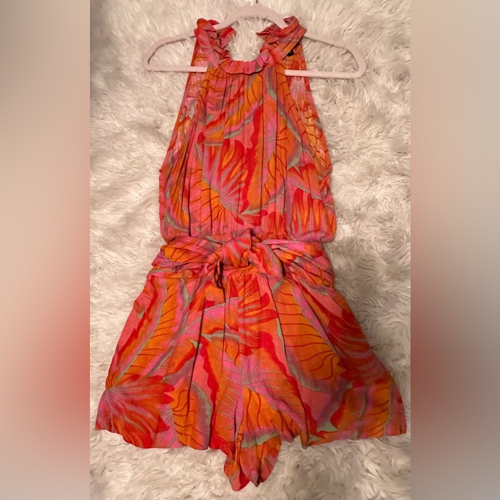 One-piece, skort with back zipper & waist-sash.  Size XS; fits like Small.